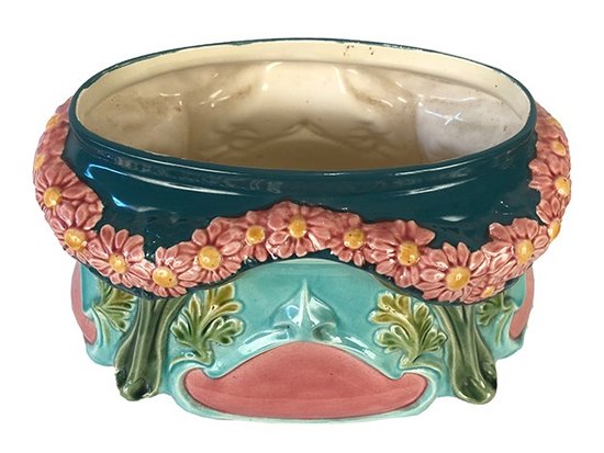 Planter in polychrome slip decorated with a garland of flowers