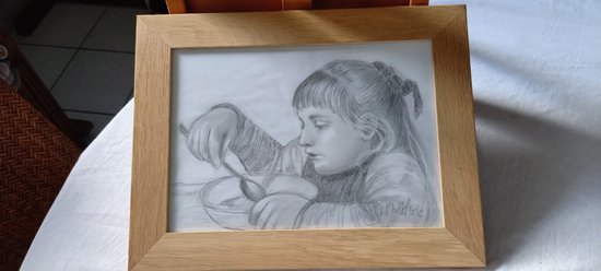 Drawing with gray pencils portrait of a little girl