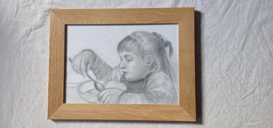 Drawing with gray pencils portrait of a little girl