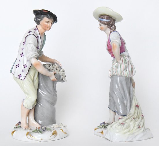 Pair of porcelain statuettes of Samson representing a couple of peasants