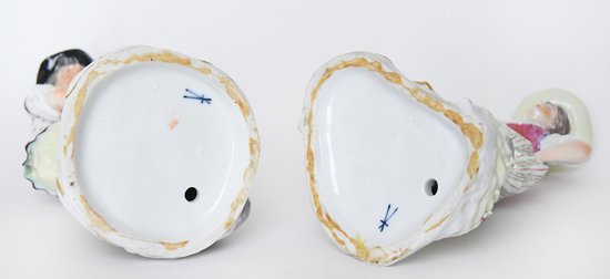 Pair of porcelain statuettes of Samson representing a couple of peasants