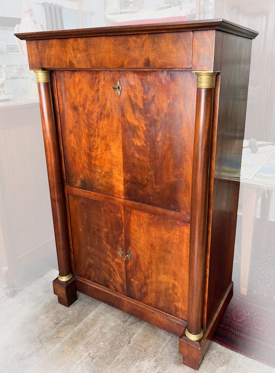 Mahogany secretary of style EMPIRE with detached columns