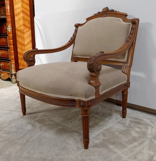 Fauteuil bas en Noyer massif, style Louis XVI – fin XIXe