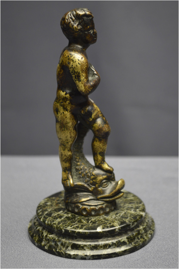 Italy, Renaissance period, 16th century, Bronze satuette representing a young man with a dolphin