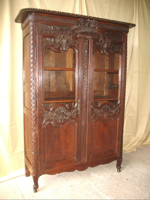 Carved and glazed oak wedding armoire from the 19th century from Normandy