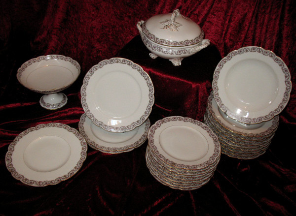 Part of a table service in porcelain of Paris, Louis XV decor, by Hache and Jullien in Vierzon