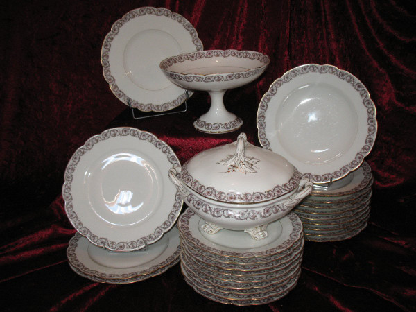 Part of a table service in porcelain of Paris, Louis XV decor, by Hache and Jullien in Vierzon