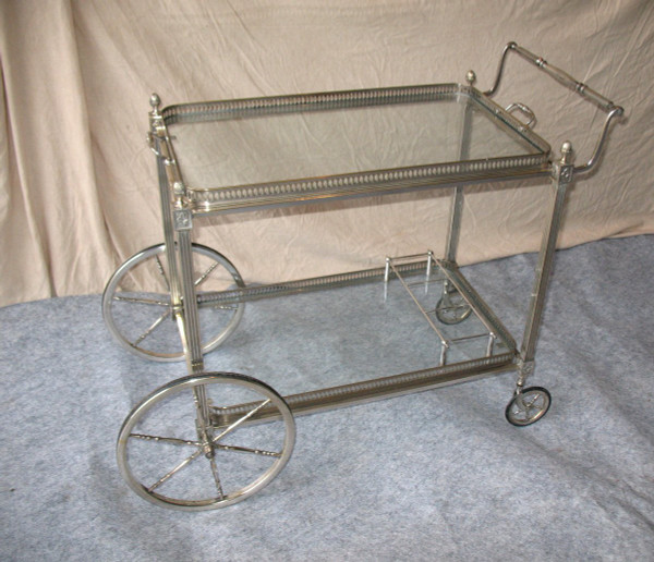 Table on wheels of the Bagués house in silver plated bronze of neo-classical style of the 40's