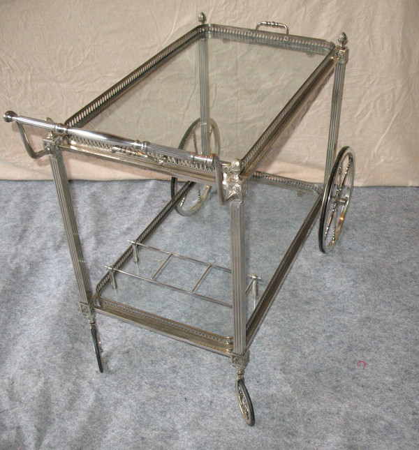 Table on wheels of the Bagués house in silver plated bronze of neo-classical style of the 40's