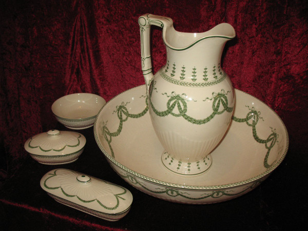 Sarreguemines earthenware toilet service, 19th century Louis XVI style, laurel decoration