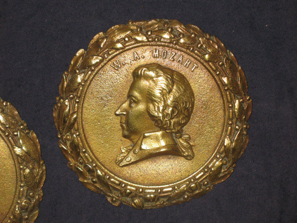 Pair of Louis XVI style bronze medallions with the effigy of Mozart and Beethoven, 19th century