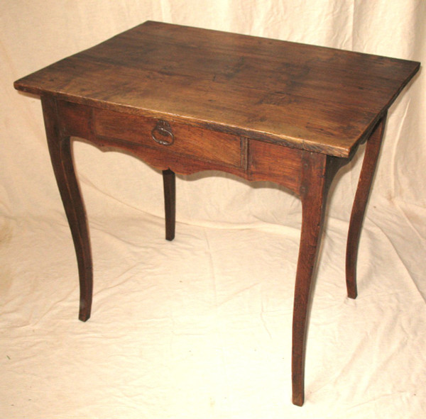 Small Louis XV period desk table in oak with an 18th century drawer