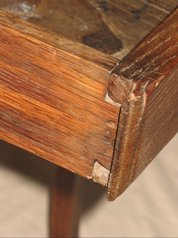 Small Louis XV period desk table in oak with an 18th century drawer