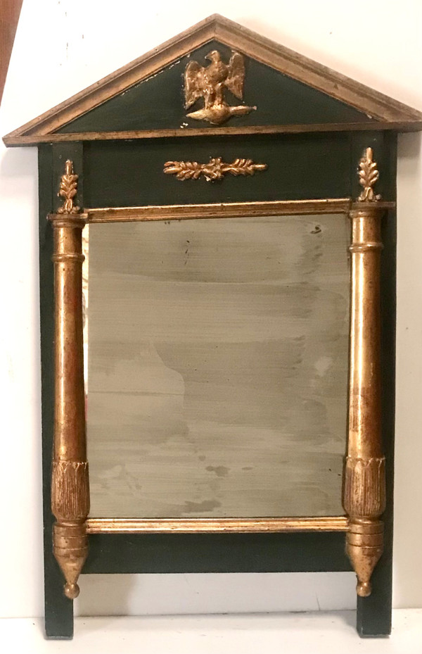 Mirror in gilded and tinted wood in the Empire style of the XIXth century