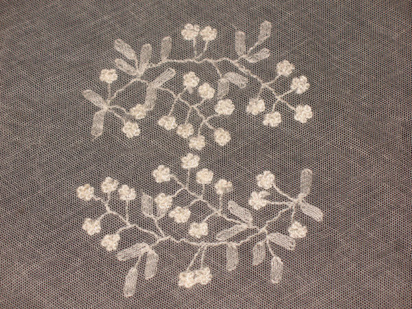 Small tablecloth in white embroidery on tulle, 19th century