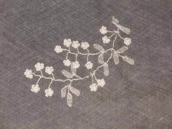 Small tablecloth in white embroidery on tulle, 19th century