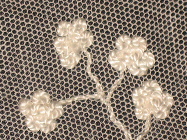 Small tablecloth in white embroidery on tulle, 19th century