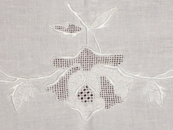 White embroidery tablecloth and days with its 12 napkins