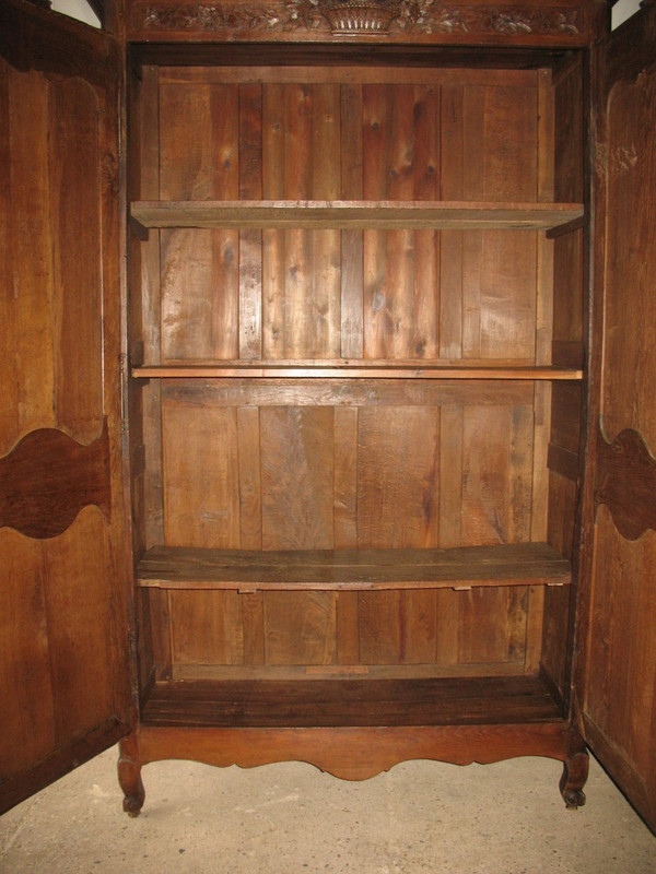 Armoire de mariage  sculptée en chêne époque 19ème Origine Normandie