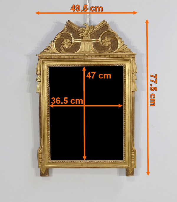 Miroir en bois doré, style louis XVI – Début XXe