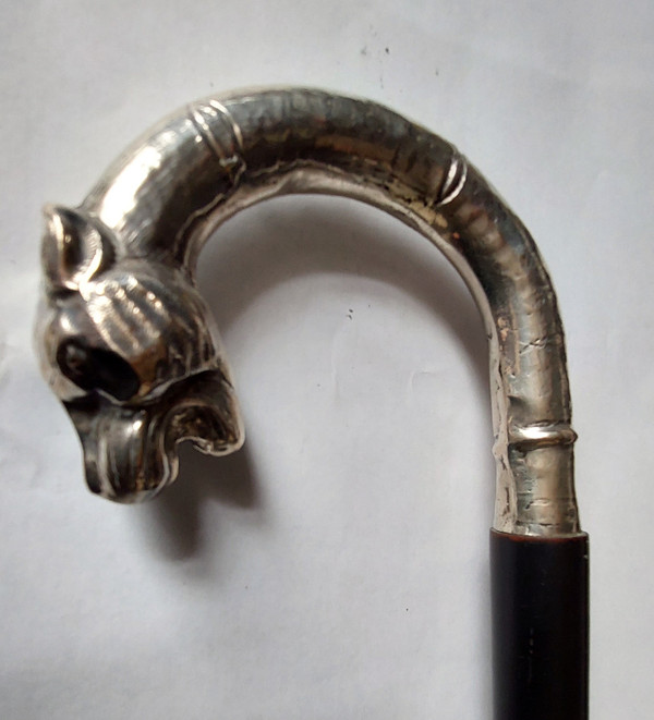 Walking stick with silver knob in the shape of a panther head, early 20th century, 90 cm long