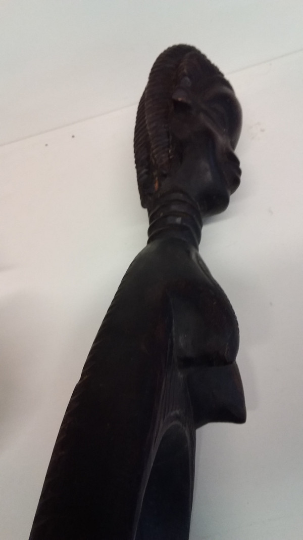 Wakémia ceremonial spoon decorated with a Liberian woman's head