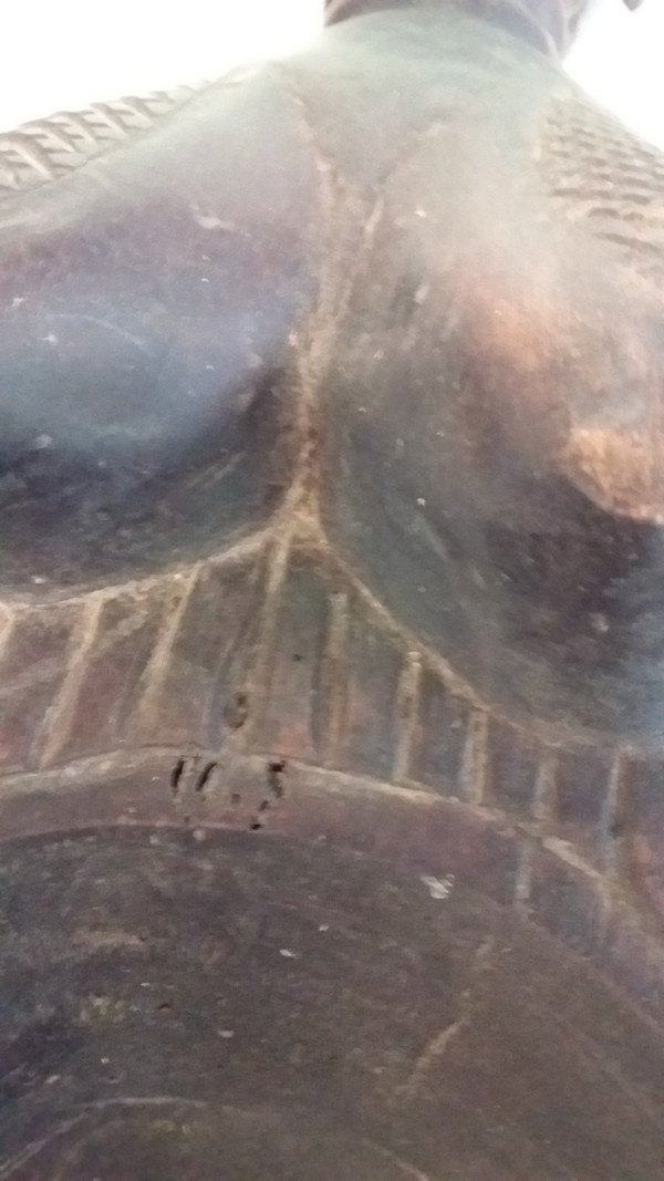 Wakémia ceremonial spoon decorated with a Liberian woman's head