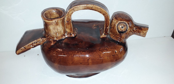 Duck-shaped jug in brown barbotine China, mid-20th century