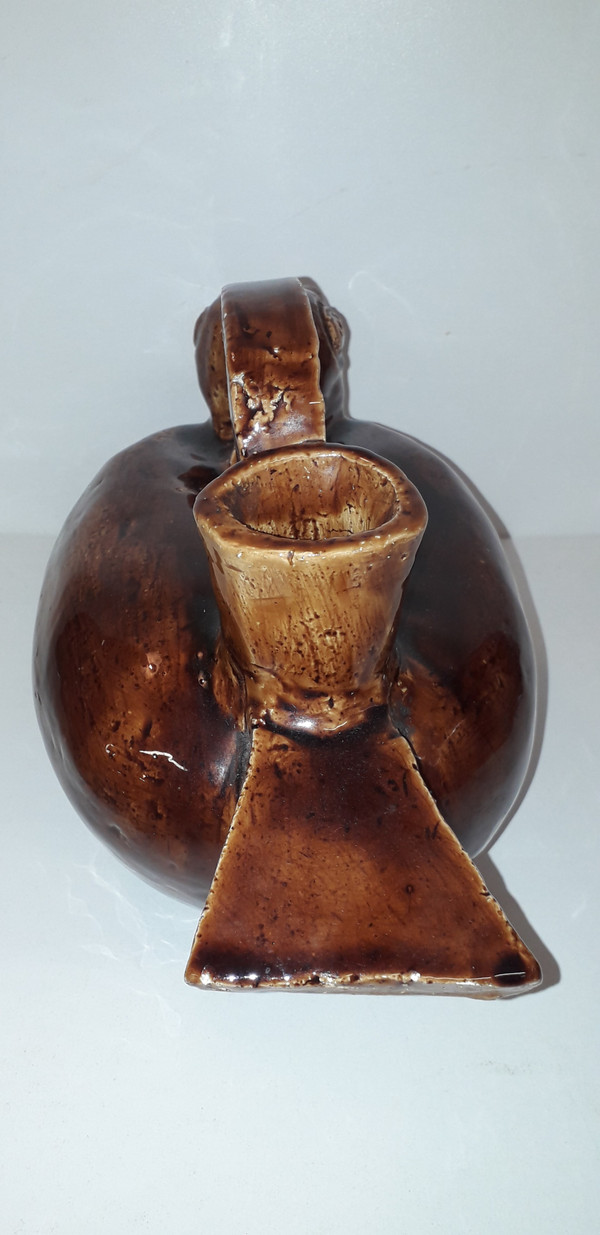 Duck-shaped jug in brown barbotine China, mid-20th century