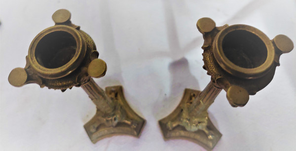 Pair of Louis XVI style candlesticks in bronze with brown patina