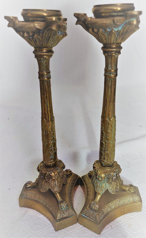 Pair of Louis XVI style candlesticks in bronze with brown patina