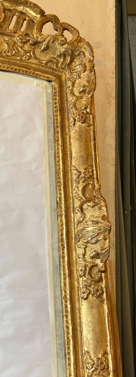 18th century Regence period carved and gilded wood mirror