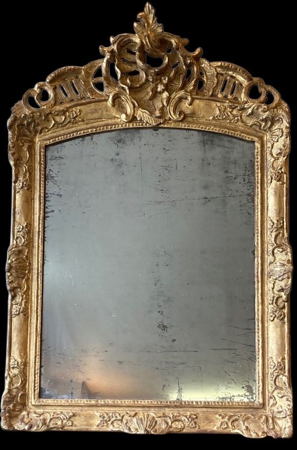 18th century Regence period carved and gilded wood mirror