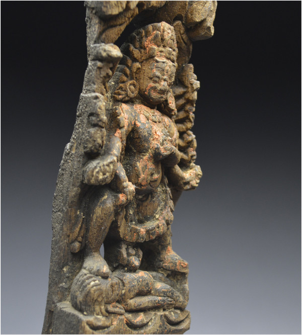 Nepal, XVIth - XVIIth century, Small wooden architectural element representing the god Shiva