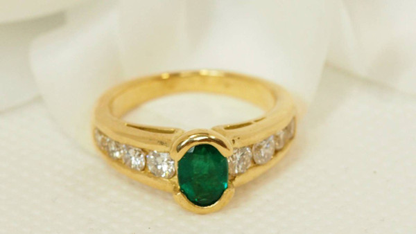 Ring In Yellow Gold, Oval Emerald And Diamonds