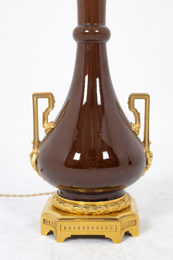 Pair of porcelain and gilt bronze lamps, circa 1880