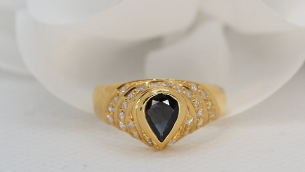 Yellow Gold Ring Set With A Pear Sapphire And Diamonds