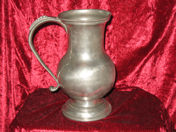 Pewter water jug in the shape of a caterpillar baluster early 18th century