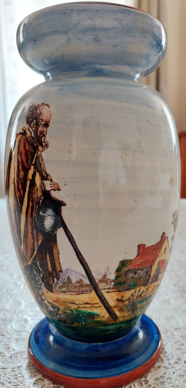 Gien earthenware vase decorated with beggars late 19th century