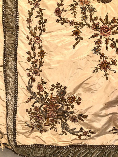 Bedspread converted into a silk portière with rich cannetille embroidery, 19th century