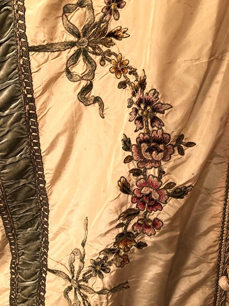 Bedspread converted into a silk portière with rich cannetille embroidery, 19th century