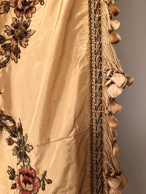 Bedspread converted into a silk portière with rich cannetille embroidery, 19th century