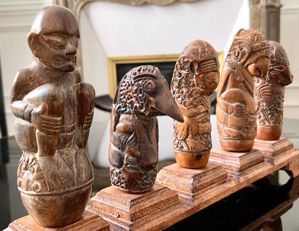 Indonesia, 19th Century, Five Carved Wood Kriss Handles with Anthropo-zoomorph decoration.