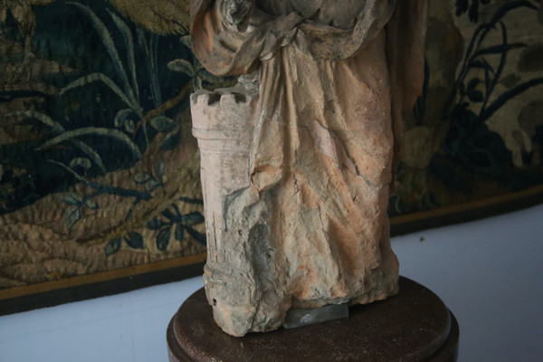 Terracotta sculpture representing Saint Barbara