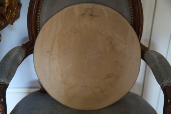 Large circular terracotta dish decorated with a fawn in a landscape.