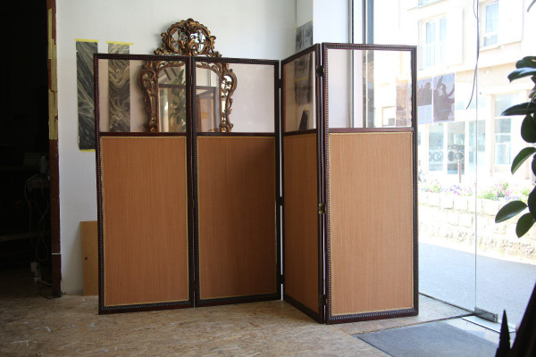 Louis XVI-style carved and stained mahogany beech screen.