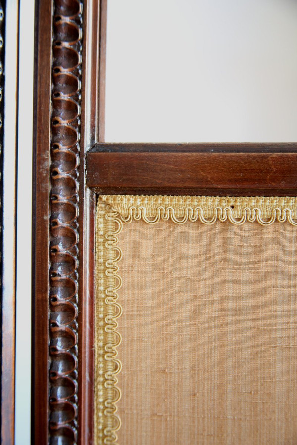 Louis XVI-style carved and stained mahogany beech screen.