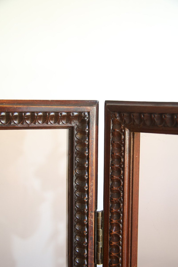 Louis XVI-style carved and stained mahogany beech screen.