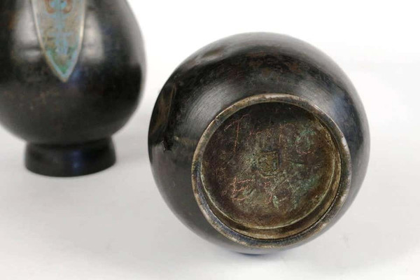 Pair of Japanese bronze vases with enamel decoration