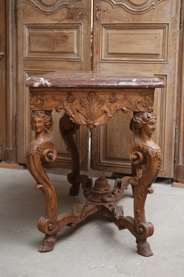 Table console en chêne sculptée d'époque Régence vers 1725.